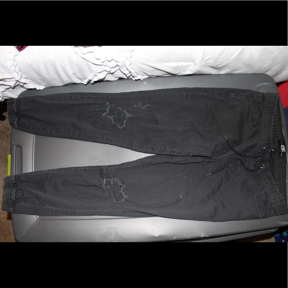 Distressed jogger style denim pant